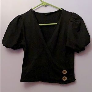 Cropped wrapped black top